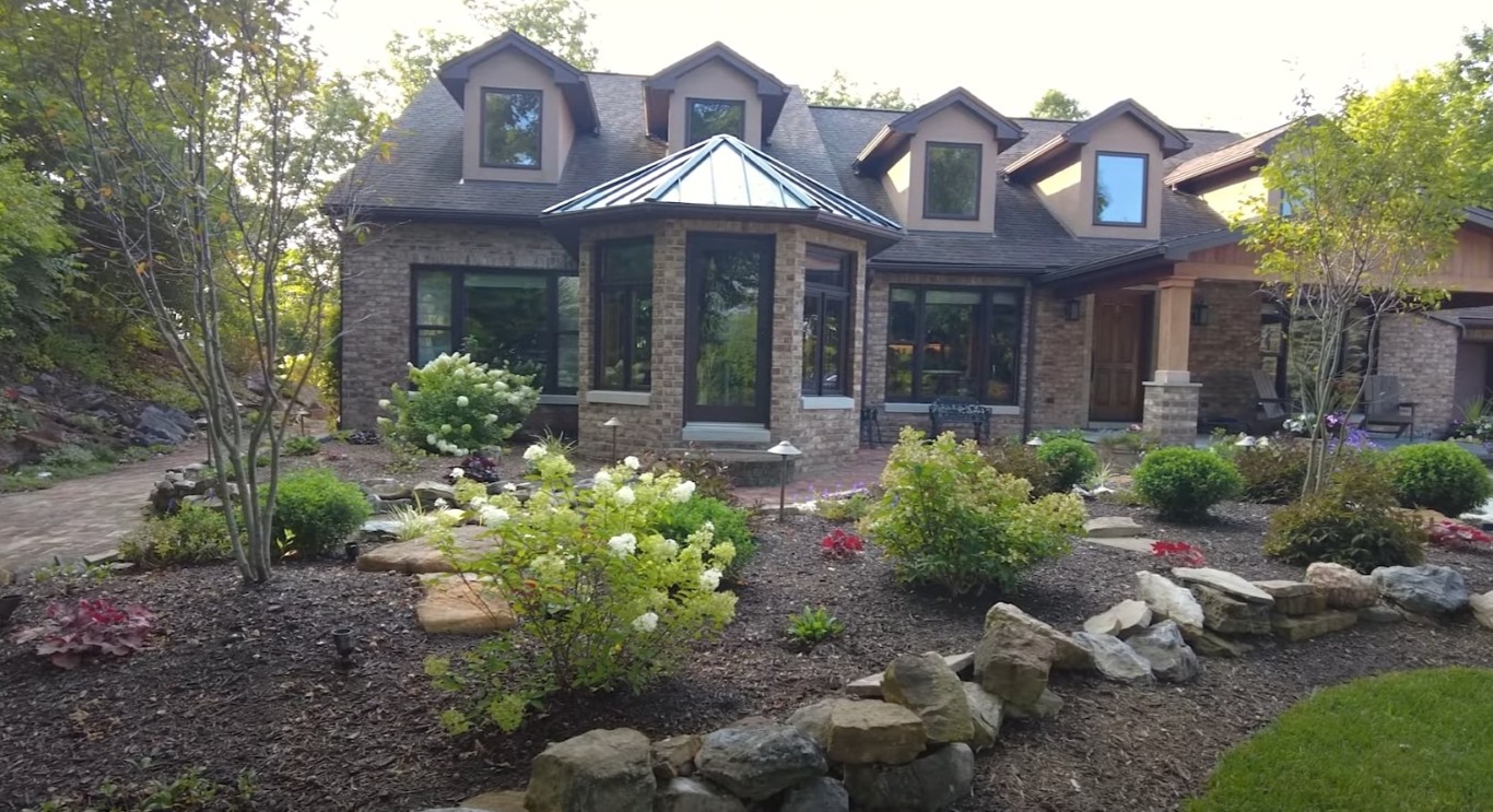 Professional landscaping in Davis, CA with beautiful garden beds and stone features